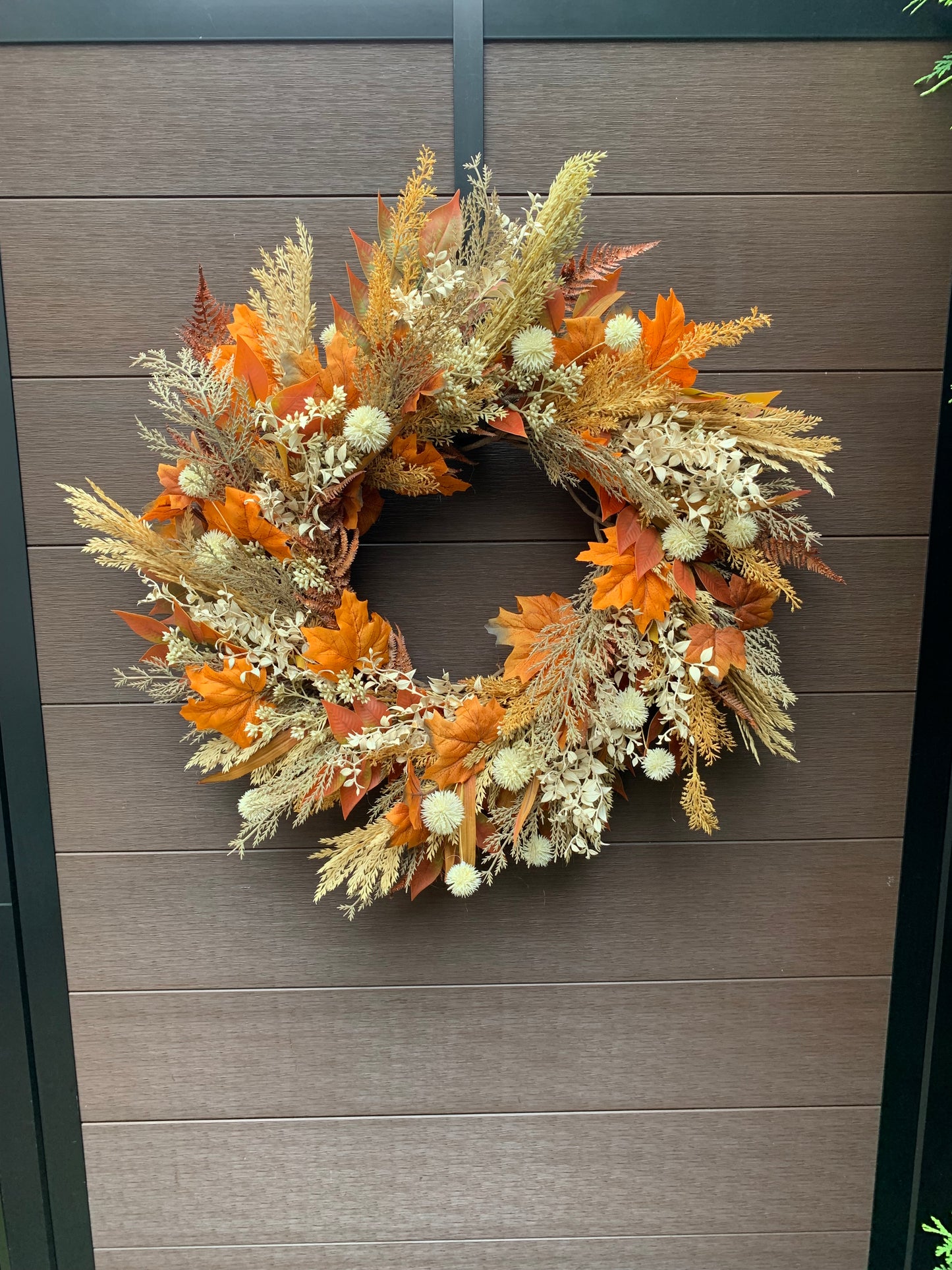 Rustic Autumn Wreath with Orange Leaves