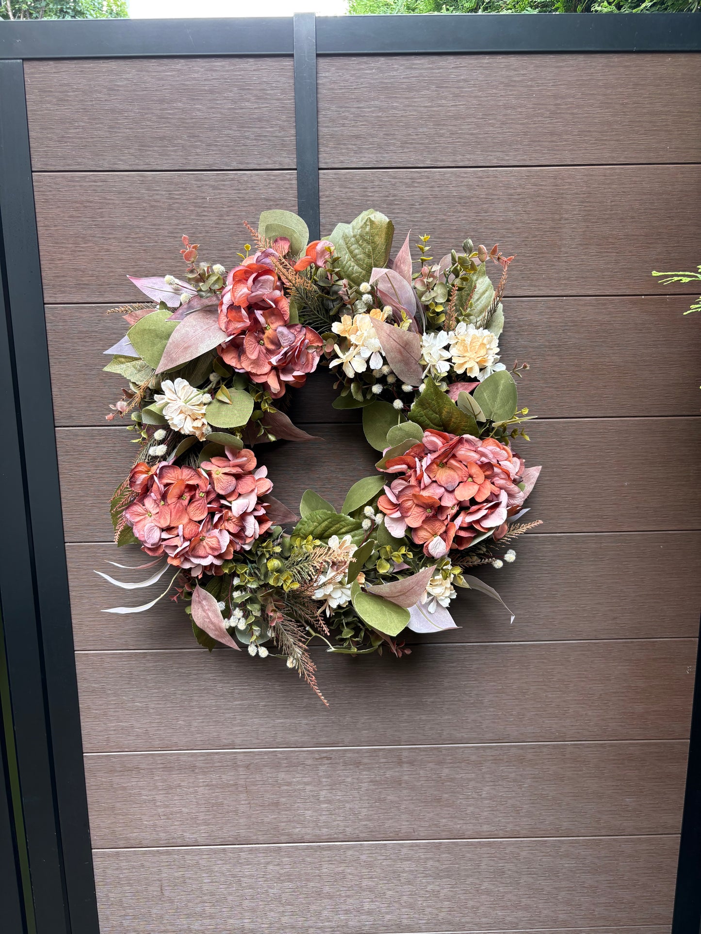 Couronne florale d’automne rose et corail faite à la main