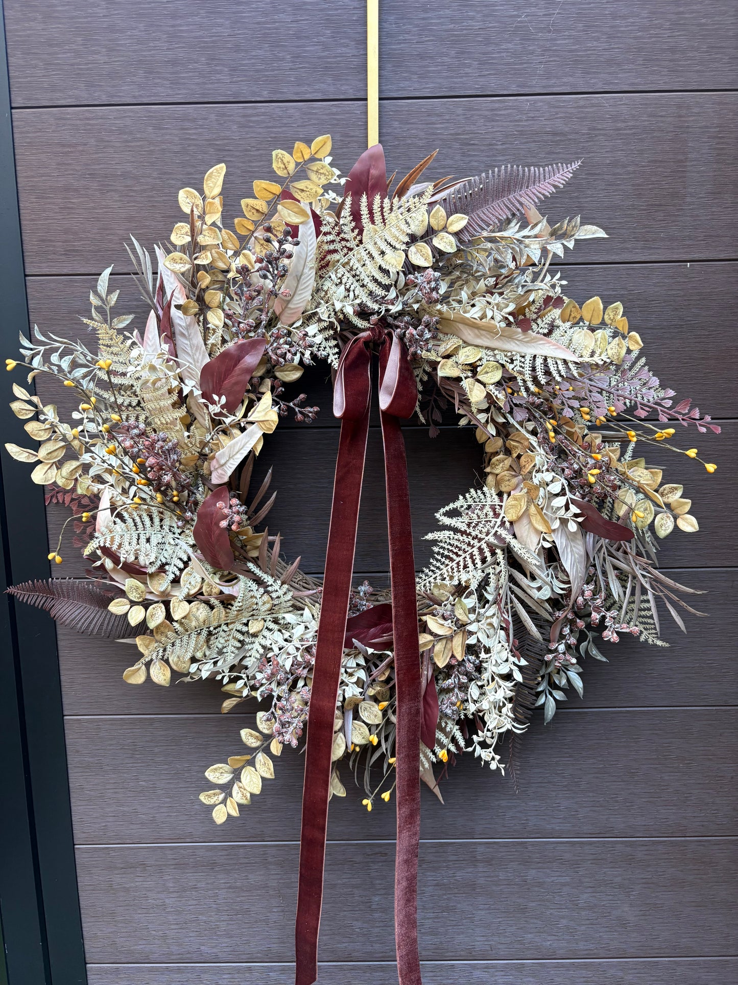 Elegant autumn wreath with golden foliage and burgundy velvet ribbon – Front door decoration