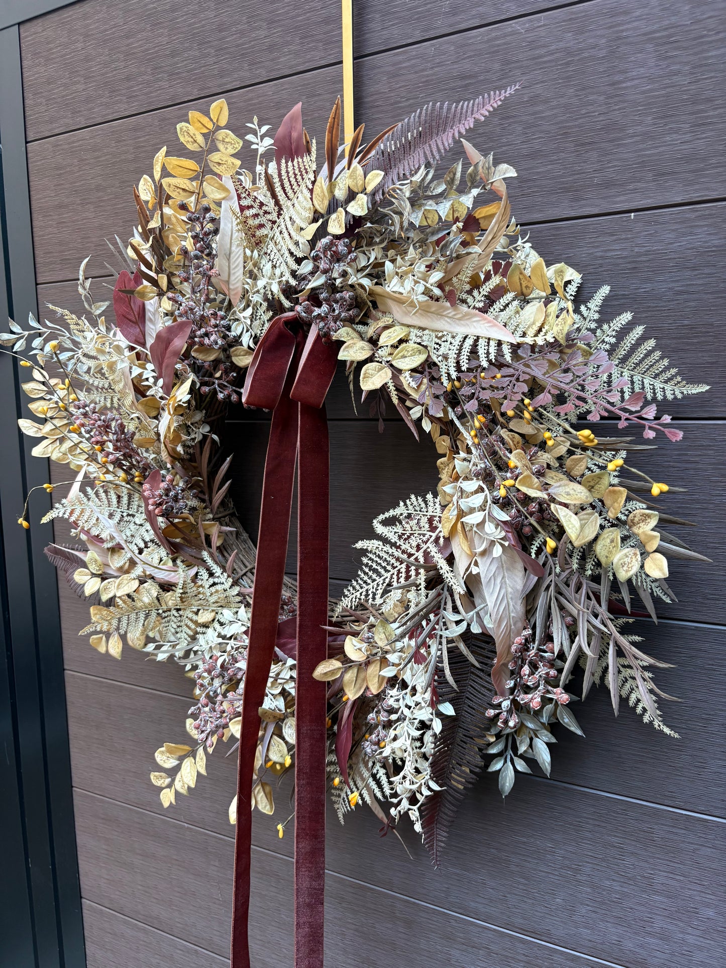 Elegant autumn wreath with golden foliage and burgundy velvet ribbon – Front door decoration