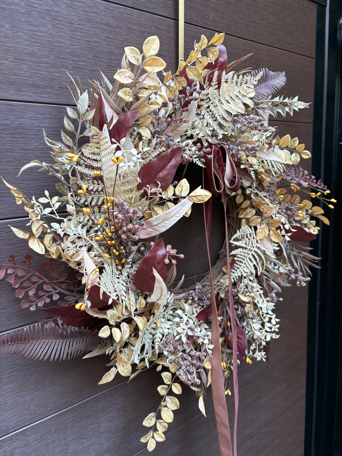 Elegant autumn wreath with golden foliage and burgundy velvet ribbon – Front door decoration