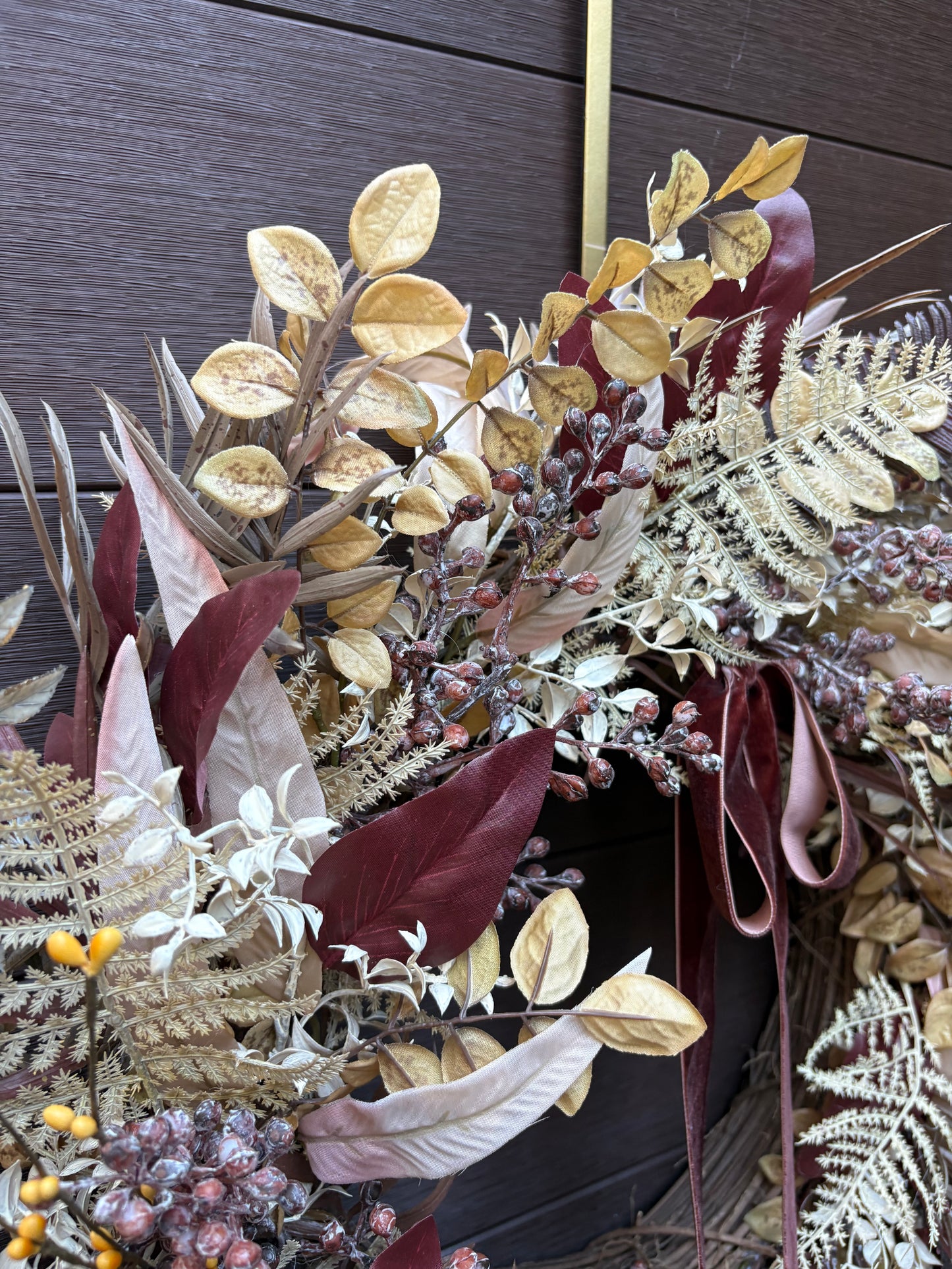 Elegant autumn wreath with golden foliage and burgundy velvet ribbon – Front door decoration